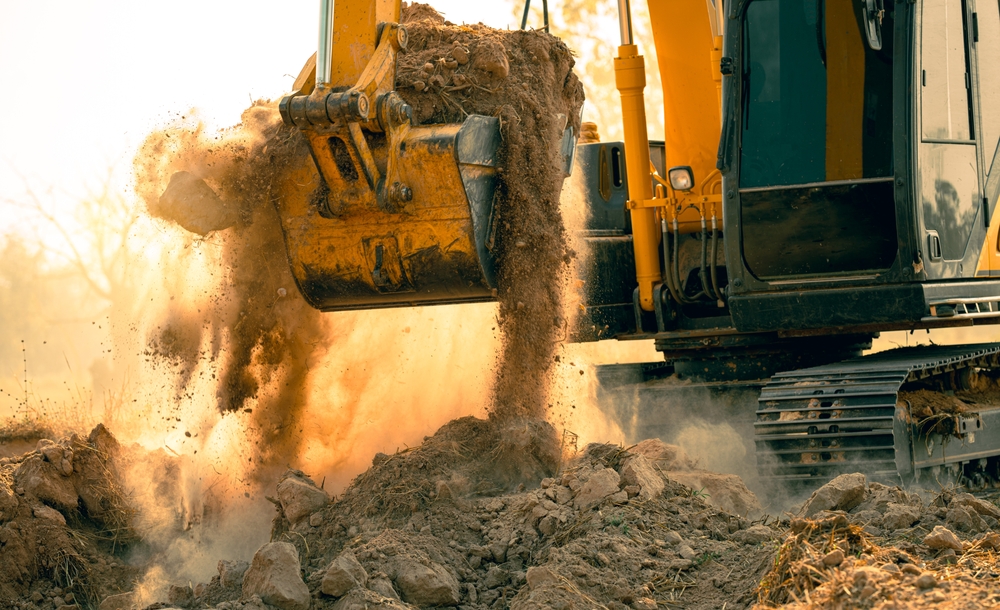 Close Up,of,excavator,at,construction,site.,backhoe,digging,soil,for