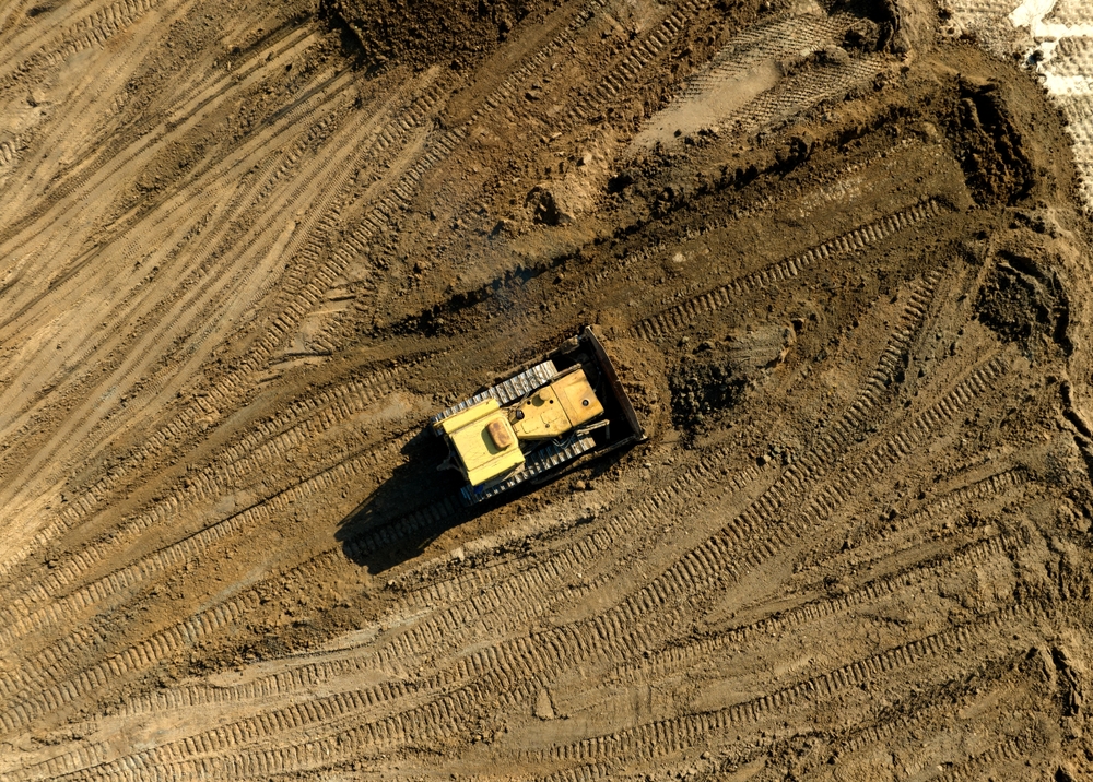 Bulldozer,at,mine,reclamation,once,mining,sand,is,completed.,land