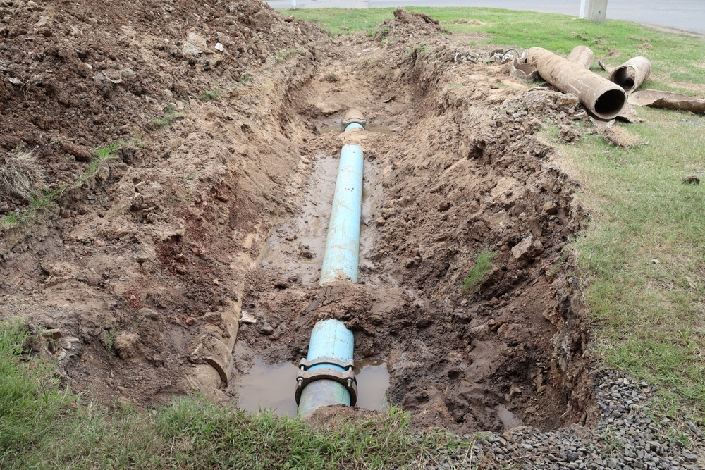 Sewer,repair,place,a,drain,in,the,ground.