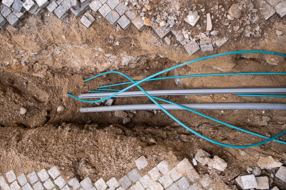 Underground,electric,cable,infrastructure,communication,installation,at,a,construction,site